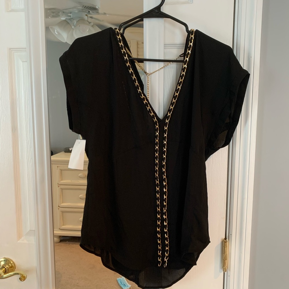 Black blouse with gold chain